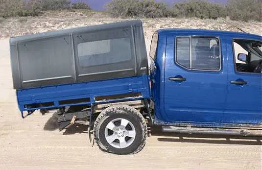 Aftermarth of a cracked Navara chassis on the beach
